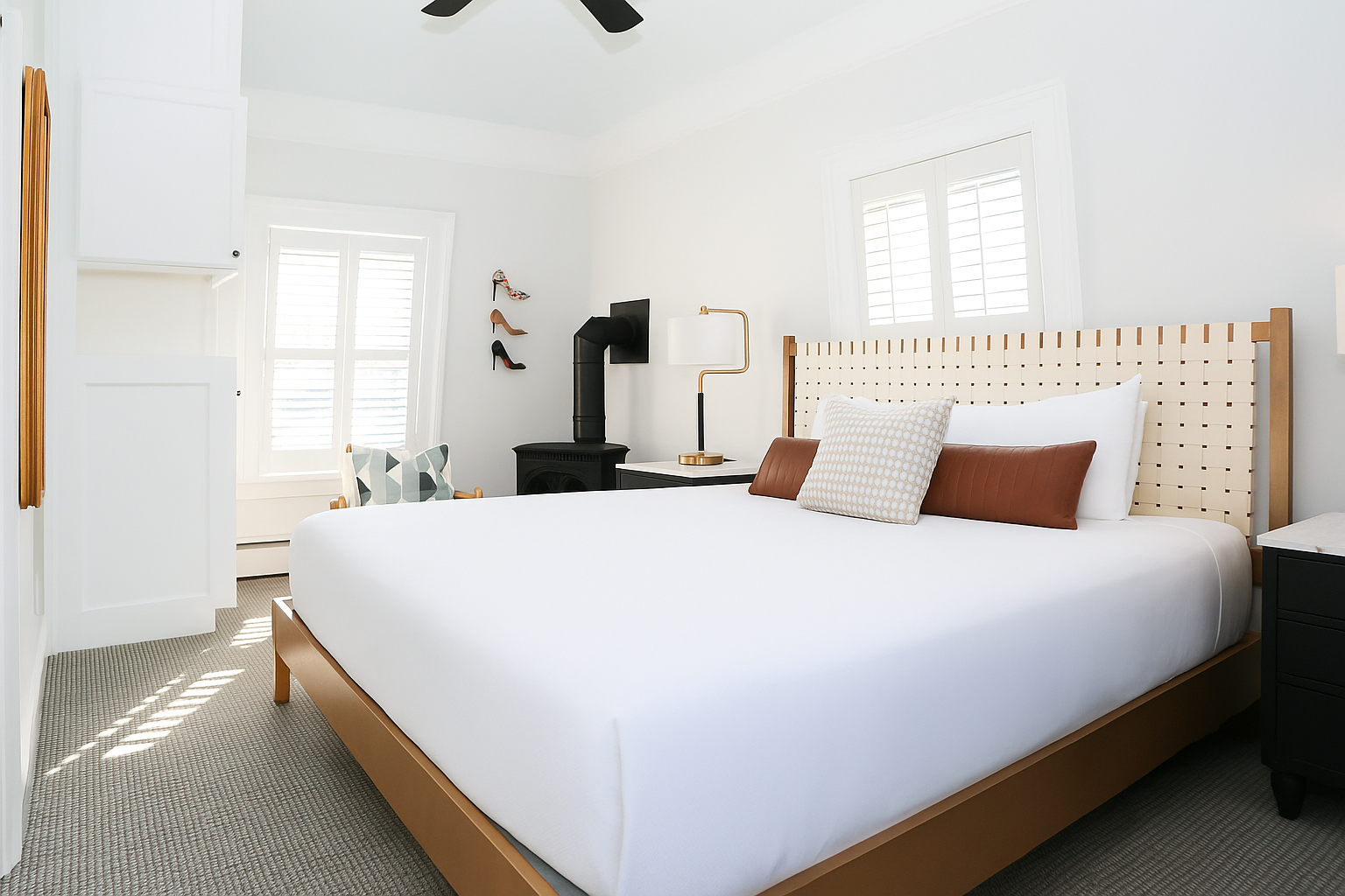 Deluxe King bedroom with wooden bed frame