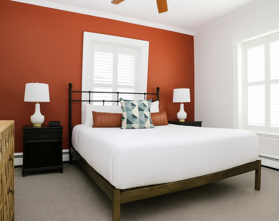 Modern bedroom with standard queen bed and two lamps