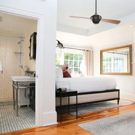 Bright room with bed, TV and bathroom