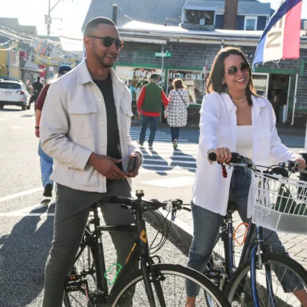 Couple with bikes on a sunny day