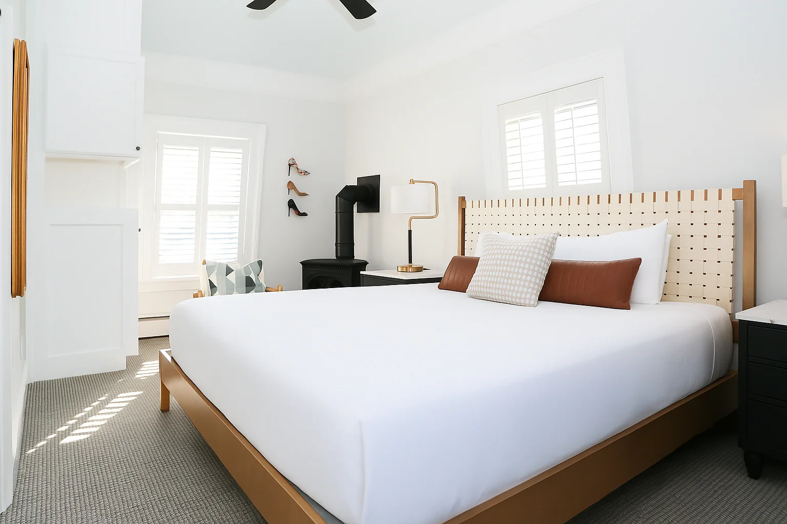 Deluxe King bedroom with wooden bed frame